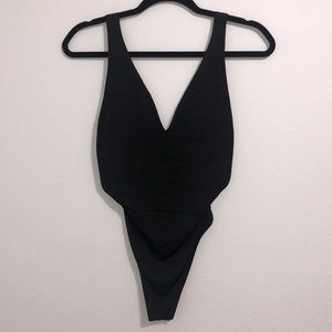 BLACK THONG BODY NEW W/O TAGS S
